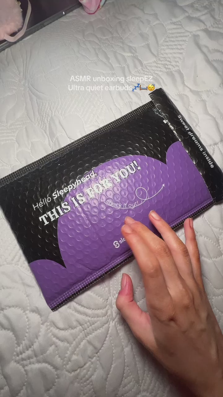 a video of a person unpacking the ultraquiet earplugs by sleepez